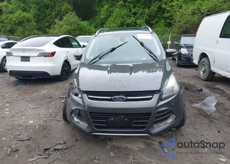 2015 Ford Escape Titanium из США, поврежденный, VIN 1FMCU9J90FUA72039